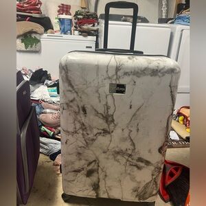 Rolling spinner luggage
